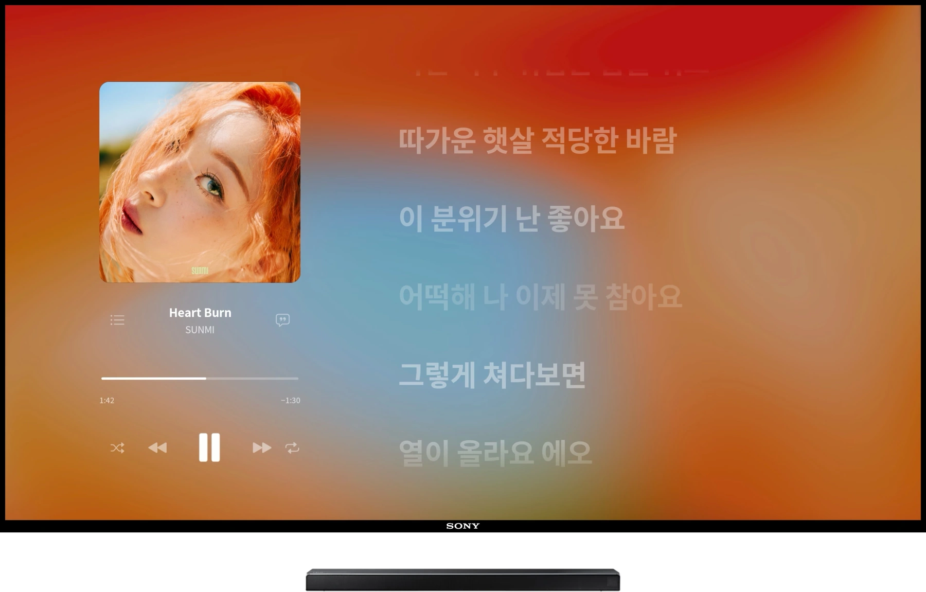 Apple Music TV 在电视上的全屏播放界面：封面、播放控制与大字歌词